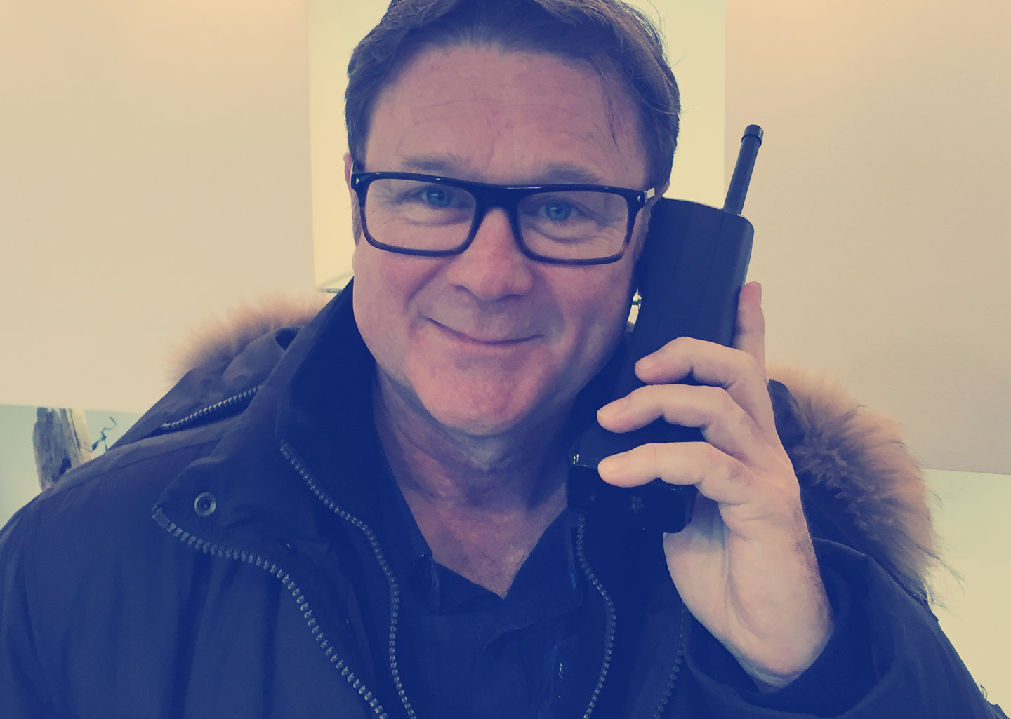 Mark Turnbull on 1980s phone. Partner at Turnbullripley Creative Agency